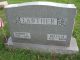 Robert E. Lawther and Della M. (?) Headstone